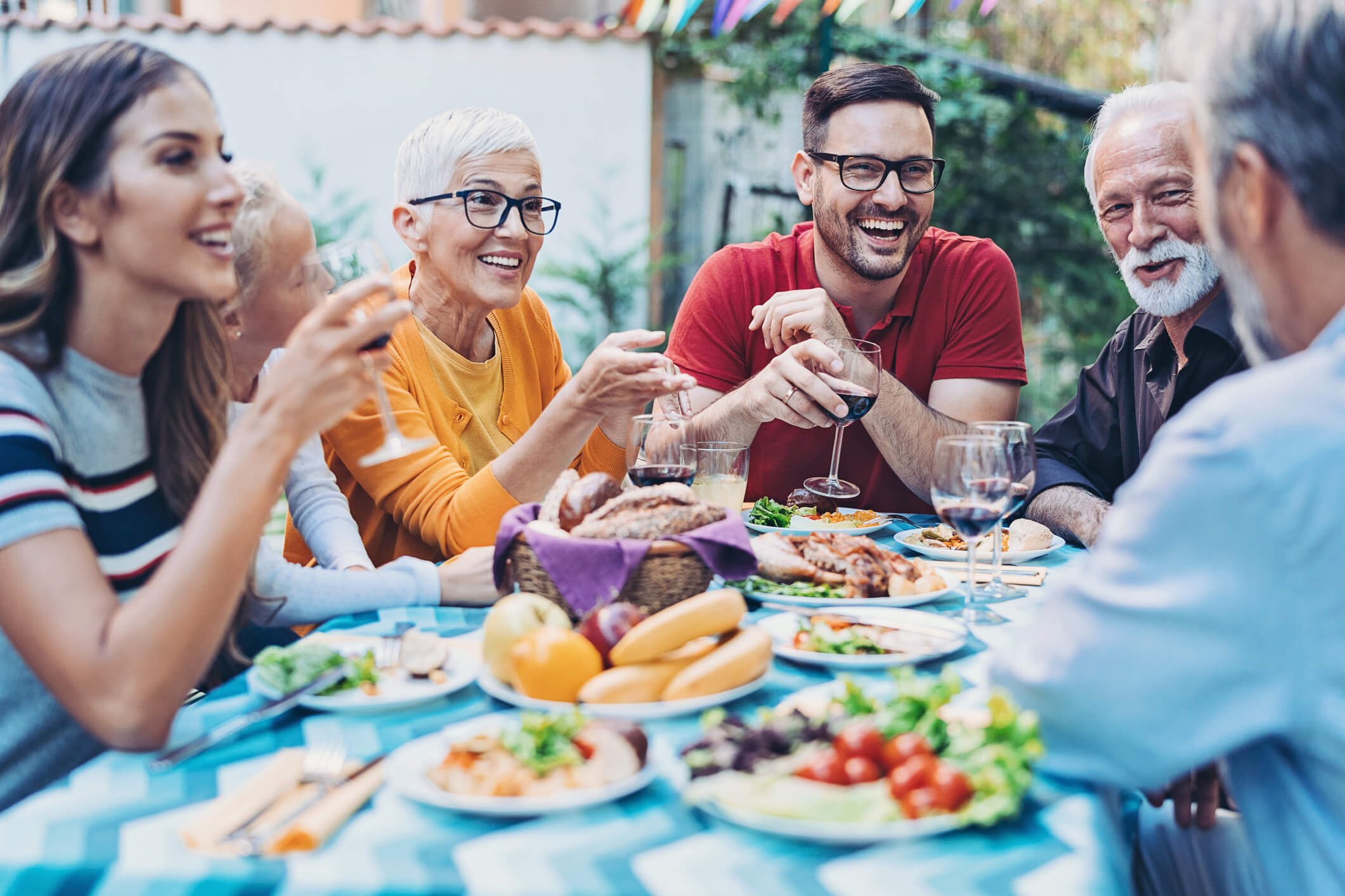 Family happily gathered around the table for dinner